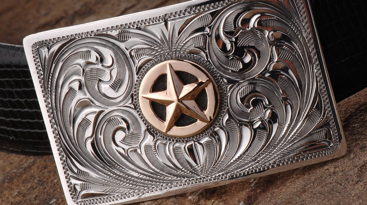 An M.L. Leddy's Est. 1922 saddle emblem, hand-tooled leather