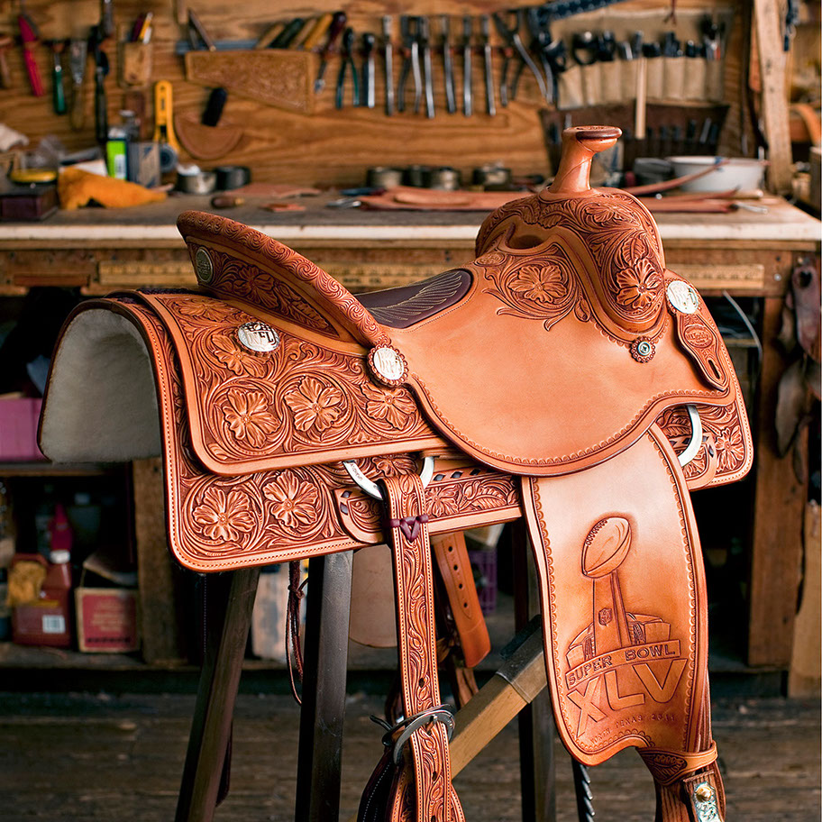 Hand-tooled custom saddle detail 12