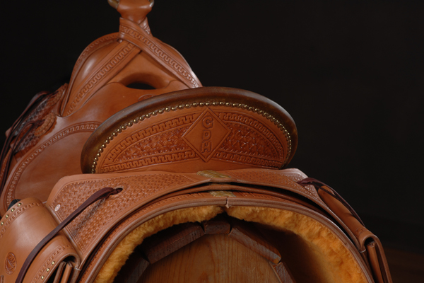Hand-tooled custom saddle detail 5
