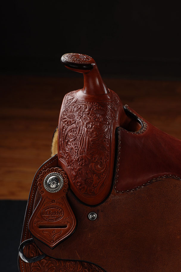 Hand-tooled custom saddle detail 9